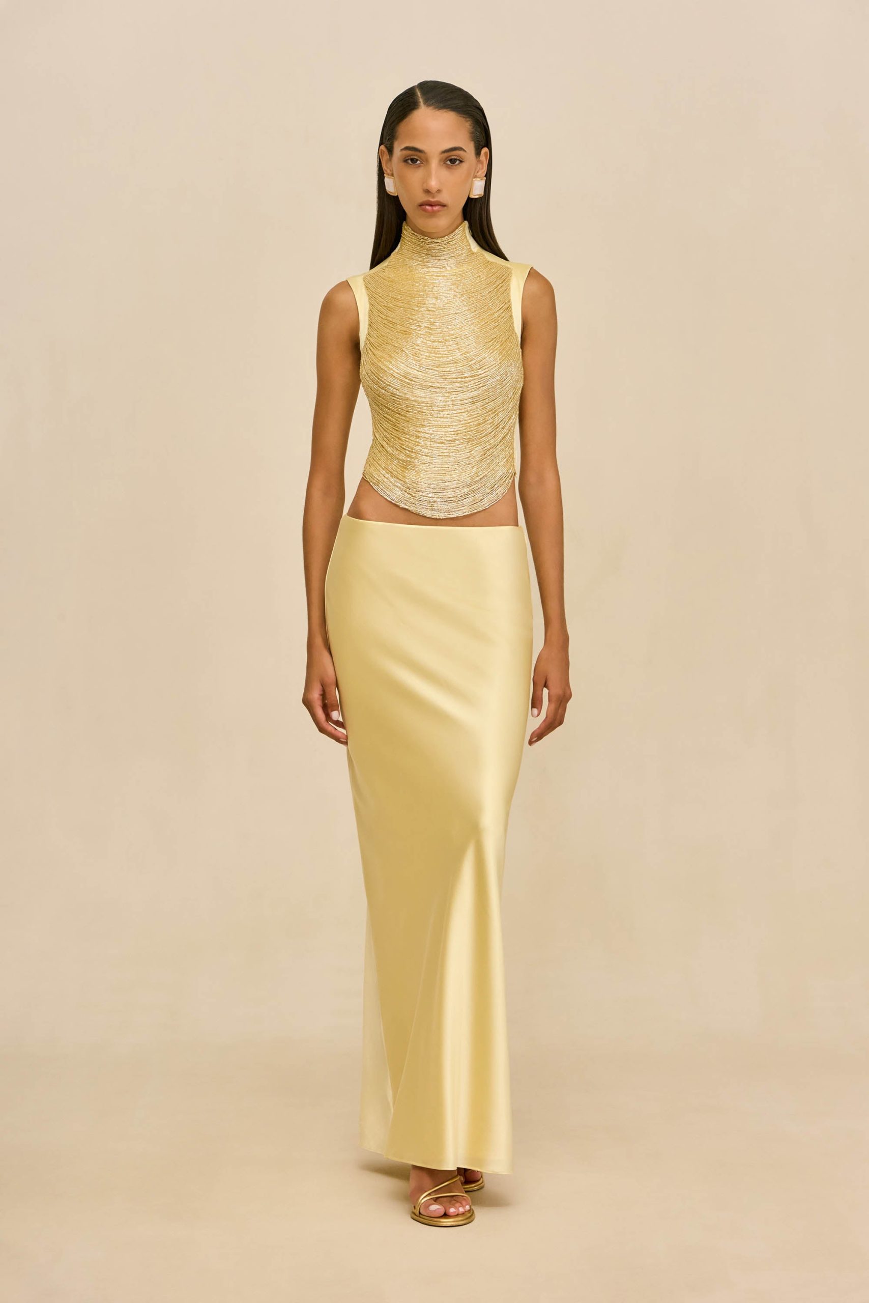 260121_DR_CG_SP_HS26_RESHT_113_TARAJI_TOP_CHANTEL_SKIRT_GLD_0011_WEBBED_e3c96a43-2e2c-43b1-a66c-b7c828a275ca-scaled
